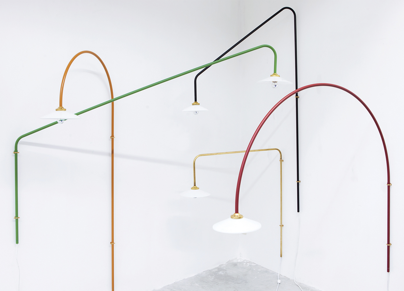 Hanging lamps by Muller Van Severen
